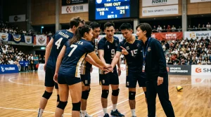 Volleyball-Spieler feiert nach einer Punkteserie mit dem Team in der Halle